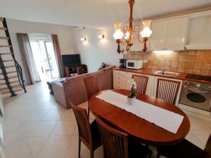 Kuchyň nebo kuchyňský kout v ubytování Apartments Villa Marid