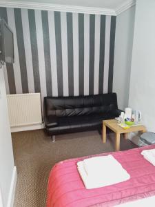 Postel nebo postele na pokoji v ubytování Dalry Guesthouse