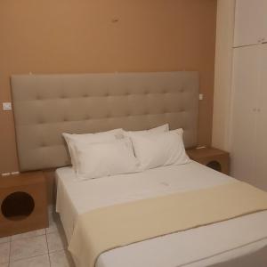 A bed or beds in a room at TSELIOS Még 14 kép