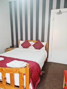 Postel nebo postele na pokoji v ubytování Dalry Guesthouse