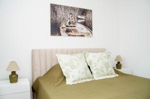 A bed or beds in a room at South Part Zamárdi
