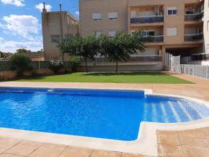 Bazén v ubytování 1 bajo con 2 Terrazas piscina y jardin nebo v jeho okolí