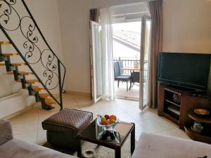 TV a/nebo společenská místnost v ubytování Apartments Villa Marid