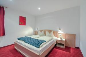 Posteľ alebo postele v izbe v ubytovaní Apartments Christa App B1