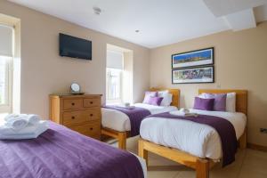 Un ou plusieurs lits dans un hébergement de l'établissement The Eyre Square Townhouse