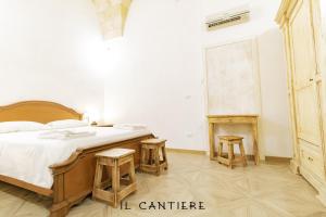Postel nebo postele na pokoji v ubytování Il Cantiere - Casa Di Una Volta.