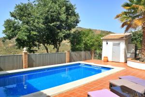 Bazén v ubytování Villa Flamenca, comoda con piscina privada, barbacoa by AndaraHolidays nebo v jeho okolí