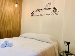 Säng eller sängar i ett rum på House Bike Sonora