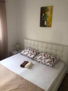Cama ou camas em um quarto em Apartmani Vanja