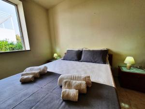 Letto o letti in una camera di Via Ugento Apartments - a pochi passi dalle spiagge