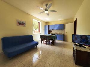 TV a/nebo společenská místnost v ubytování Via Ugento Apartments - a pochi passi dalle spiagge