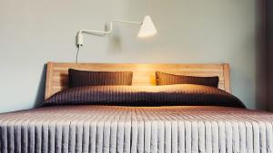 Postel nebo postele na pokoji v ubytování La Scivola Rooms