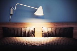 Postel nebo postele na pokoji v ubytování La Scivola Rooms