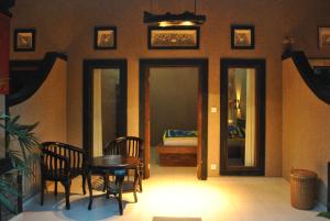 Posezení v ubytování Pondok Rahayu Guest House