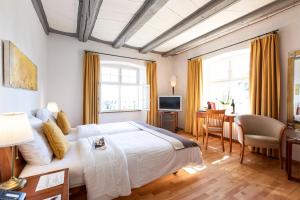 TV a/nebo společenská místnost v ubytování Hotel de Charme Römerhof