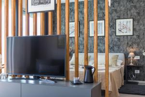 TV a/nebo společenská místnost v ubytování Cubic