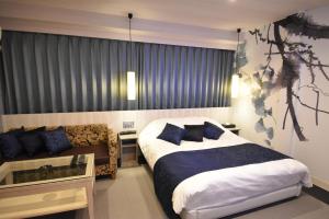 Postel nebo postele na pokoji v ubytování HOTEL IORI - Adult Only