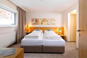Voodi või voodid majutusasutuse Hotel Zirbenhof toas