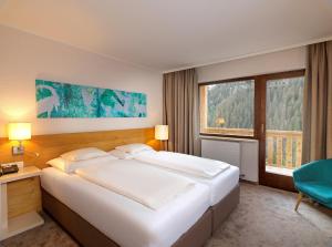 Voodi või voodid majutusasutuse Hotel Zirbenhof toas