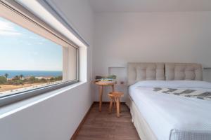 Postel nebo postele na pokoji v ubytování Terra d'Oro Sea view villa with private pool