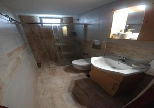 Kúpeľňa v ubytovaní Dora Property