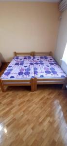 Ein Bett oder Betten in einem Zimmer der Unterkunft Vila Nikola & Aleksa