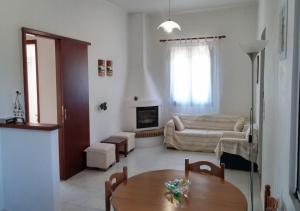 Posedenie v ubytovaní Dora Property