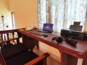 TV a/nebo společenská místnost v ubytování Happy Buddha Homestay + 28 fotografií