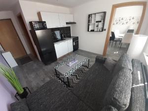 Kuchyňa alebo kuchynka v ubytovaní Apartmán LauMar 3