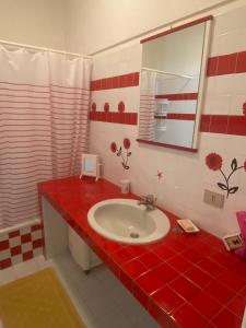 Ένα μπάνιο στο Gerani Quadrilocale +7 φωτογραφίες