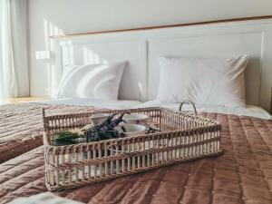 A bed or beds in a room at Owl Villas