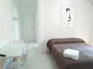 Voodi või voodid majutusasutuse B&B L'Altare Bianco toas