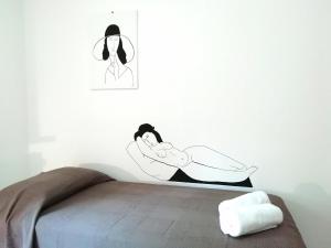 Voodi või voodid majutusasutuse B&B L'Altare Bianco toas