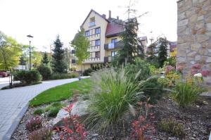 Vonkajšia záhrada v ubytovaní Apartament harmonic aparts