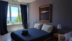 Postel nebo postele na pokoji v ubytování cascading villa nebbo dubrovnik