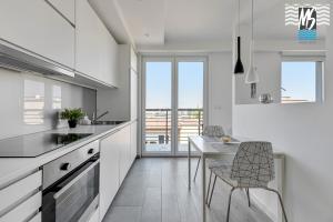 Kuchyňa alebo kuchynka v ubytovaní MS Apartments Green Hill I