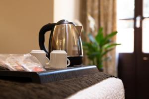 Posteľ alebo postele v izbe v ubytovaní Hotel San Juan de los Reyes