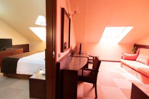 Posteľ alebo postele v izbe v ubytovaní Hotel San Juan de los Reyes