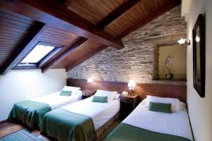 Posteľ alebo postele v izbe v ubytovaní San Clemente by Pousadas de Compostela