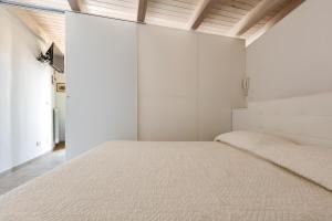 Postel nebo postele na pokoji v ubytování Trullo Monte Cannone by BarbarHouse