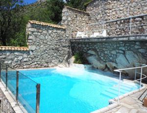 Bazén v ubytování cascading villa nebbo dubrovnik nebo v jeho okolí