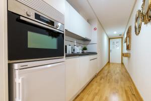 Kuchyňa alebo kuchynka v ubytovaní MalagaSuite cozy center apartment & parking