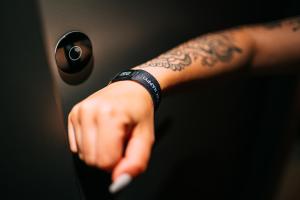 a person with a hand holding a door handle at CAB20 in Hamburg