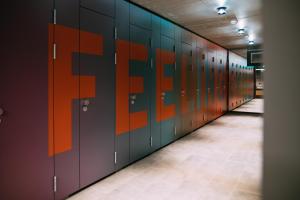 a row of lockers in a hallway with the word fire at CAB20 in Hamburg