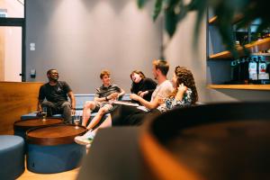 a group of people sitting in a room at CAB20 in Hamburg