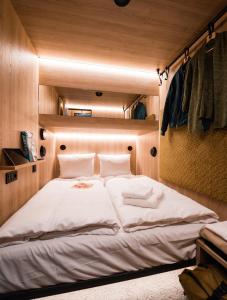 a bedroom with a large white bed in a room at CAB20 in Hamburg