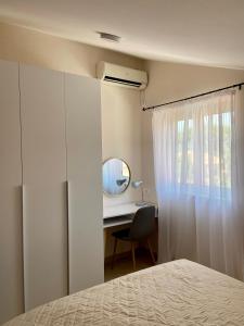 Apartment Golubović tesisinde bir odada yatak veya yataklar