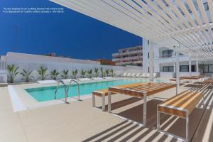 a rendering of a swimming pool on the roof of a building at Sunrise Suites in Ibiza Town