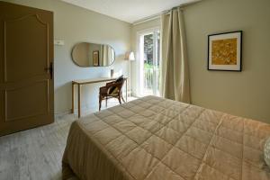 Ένα ή περισσότερα κρεβάτια σε δωμάτιο στο Résidence La Ménado +162 φωτογραφίες