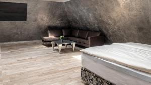 Ένα ή περισσότερα κρεβάτια σε δωμάτιο στο Buddha Hotel
